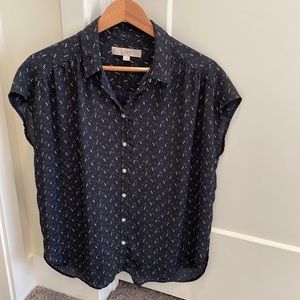 Navy blue patterned loft button down - no sleeves. Size medium.